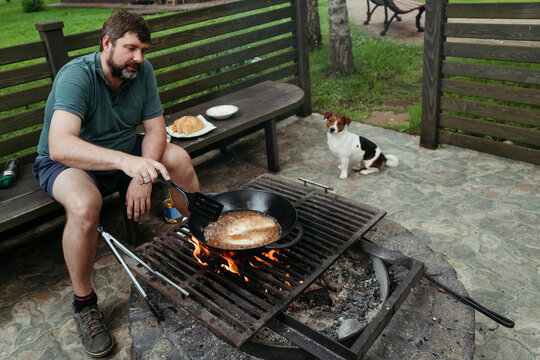 Cooking Fish Outdoors With a Dog by My Side