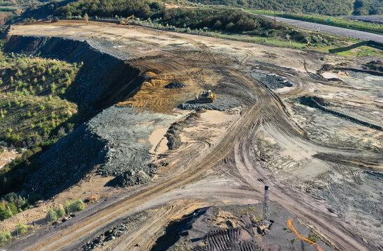 Industrial Mine Backfill Site with Machinery and Excavation Equipment