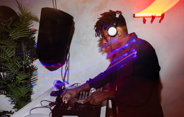 DJ mixing music at a lively night event