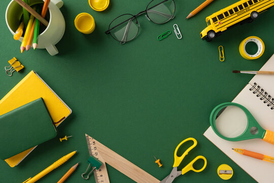Colorful school supplies and stationery organized on a desk, perfect for back-to-school themes