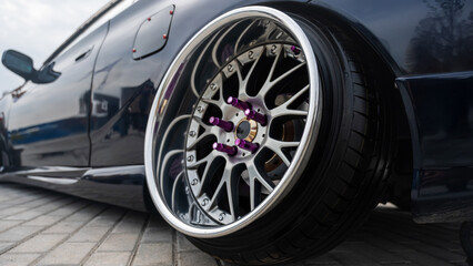 Close-Up of Custom Car Wheel and Tire Excellence. 