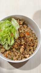 Yang Chow Fried Rice Food and Cuisine, A Plate of Oriental Food Shrimp Fried Rice Served with Tomato Sauce and Lime Slice.