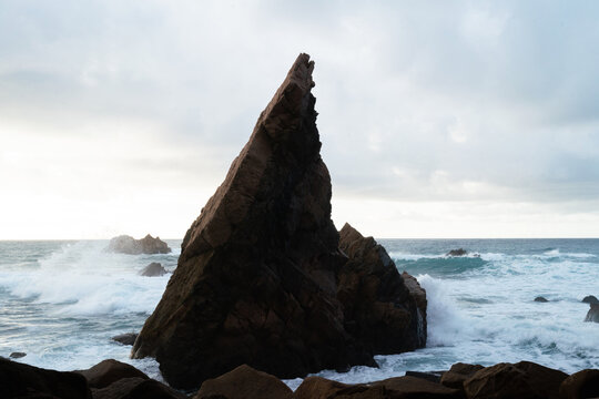 A rock in the wild Atlantic ocean in Portugal
