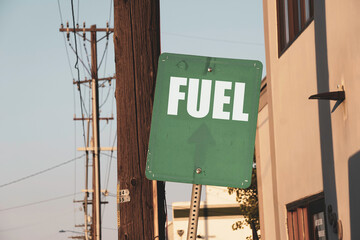 Old worn urban fuel sign