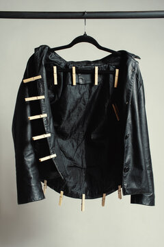 Leather jacket with wooden hooks 