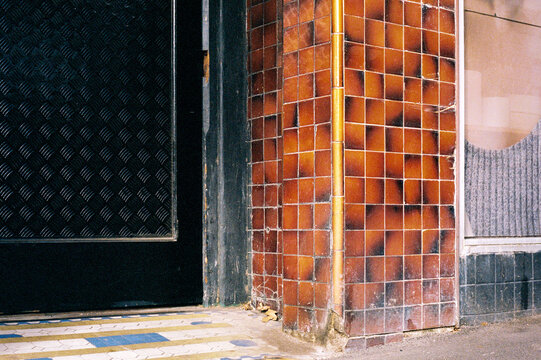 Textured brick wall and patterned floor perspective