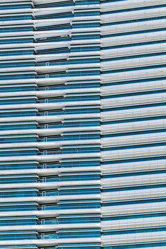 Abstract pattern in symmetrical residential glass building