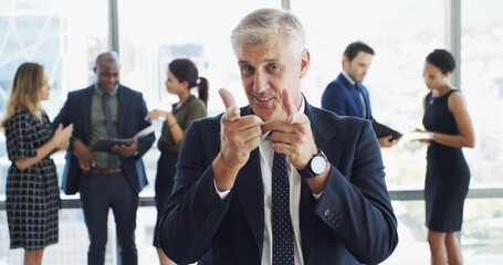 Obraz premium Portrait, business or man in office, finger gun or support with greeting, encouragement or confidence. Achievement, people or happy consultant with hand gesture, feedback or thank you with success