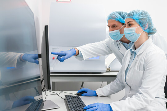 Scientists Working Together In The Lab