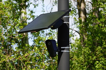 Flock safety police law enforcement license plate reader set up outside to help catch vehicle...