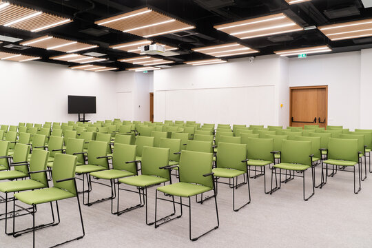 Empty Conference Room with Neatly Arranged Seats

