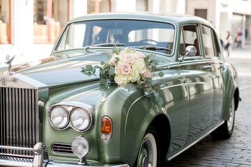 Vintage Green Wedding Car Decorated with Flowers