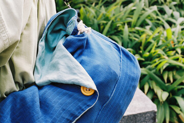 Stylish Textile Bag with Colorful Fabric and Button