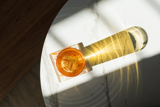 Amber Drink Surrounded by Morning Light
