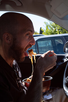 Eating Noodles in Car