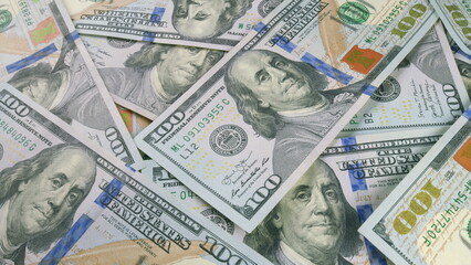 A sizable pile of freshly minted one hundred dollar bills ready for transactions and trade