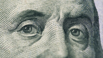 An intricate closeup depiction of a historical figure featured prominently on currency notes