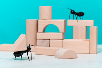ants building a structure with building blocks