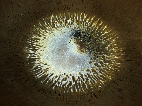 Textured background of microscopic glaze of Chinese ceramics tea cup
