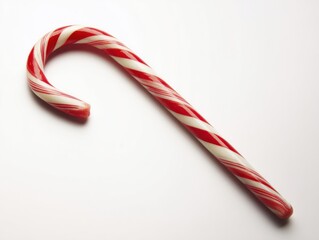 Red and white striped candy cane on white background

