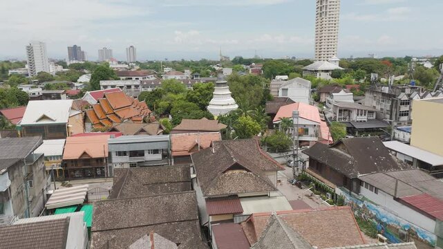 Wat Ket Neighbourhood And Buddhist Temple Stupa In Mueang Chiang Mai District, Chiang Mai, Thailand. Aerial Drone Shot
