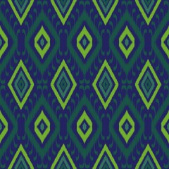Geometric pattern featuring alternating diamond shapes in shades of green and blue