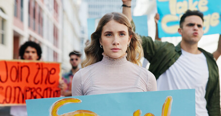 Community, angry and woman with poster in city for announcement, human rights or power. Group, politics and people in protest with sign for rally, justice or society for change in government