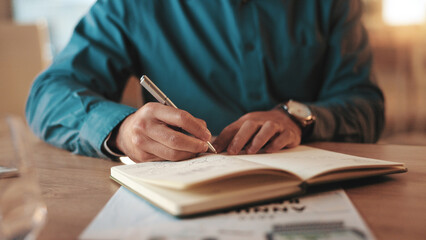 Person, hands or writing with book at night for reminder, schedule or business notes at office...