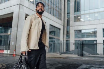 Handsome man walking in the city