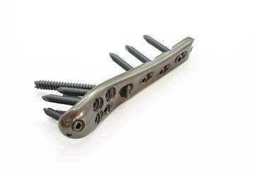 A surgical implant Proximal Femur titatium plate with screws for bone fixation, designed for stability and support