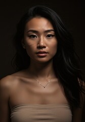 Naklejka premium Portrait Photography Captivating Asian Woman in Dramatic Lighting