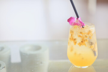 passion fruit lemonade background, cold lemonade in a glass, delicate texture cold tropical drink...
