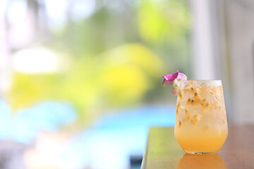 passion fruit lemonade background, cold lemonade in a glass, delicate texture cold tropical drink...