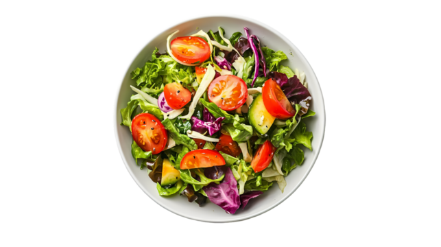 A top view of a salad with lettuce tomatoes and other greens in a white bowl isolated on transparent background