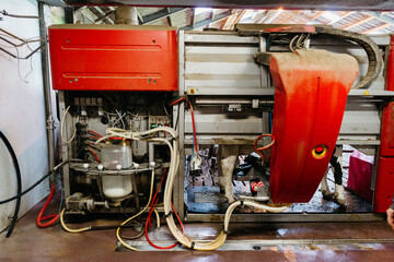high-tech milking machine in a modern dairy setup.