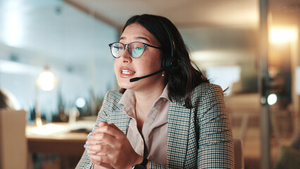 Contact us, explain and headset with woman in call center for assistance, help or support at night. Communication, computer and solution with person at office for online customer service in evening