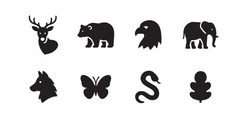 Obraz premium Wildlife Silhouette Icons - Deer, Bear, Eagle, Elephant, Wolf, Butterfly, Snake, and Tree for Stock Use in Web Design, Apps, and Creative Projects