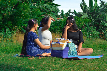 Laughter and dialogue fill the air as three teenage girls enjoy a meal and bond together under the...