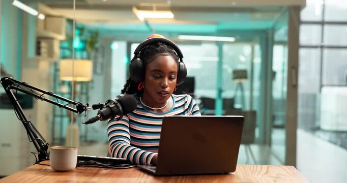 Black woman, laptop and announcer with headphones or mic for audio podcast or broadcast at office. Female person, caster or speaking on air or computer for radio communication, news or announcement