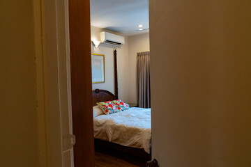 Bedroom view seen from outside though an open door
