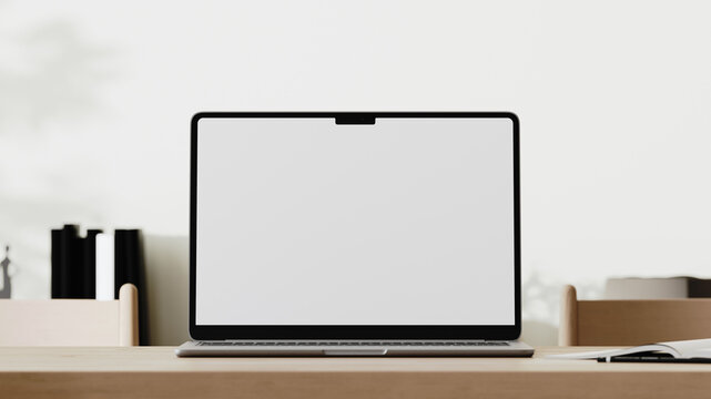 Close-up of a laptop with white screen
