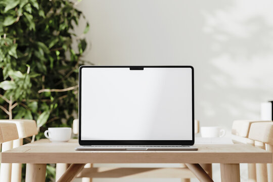 Blank laptop screen mockup on a table, 3d render