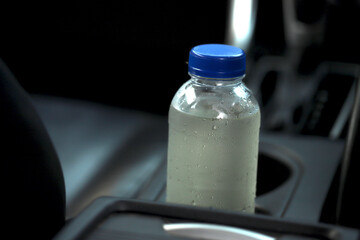 The water bottle in the car.