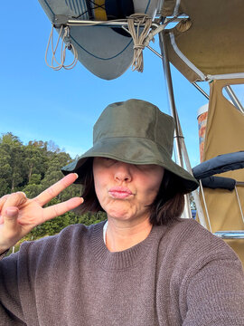 Woman Making Funny Face on Boat