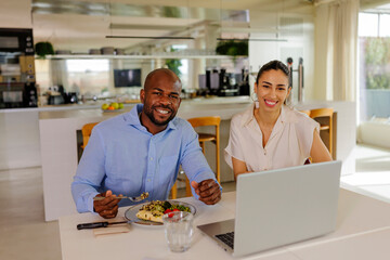 Businesspeople having lunch break together at office