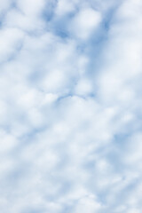 Fluffy White Clouds in a Blue Sky