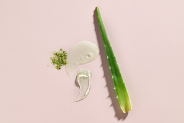 Aloe vera leaf with gel and powder, natural skincare product ads