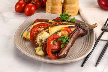 Baked tomato with mozzarella and tomato