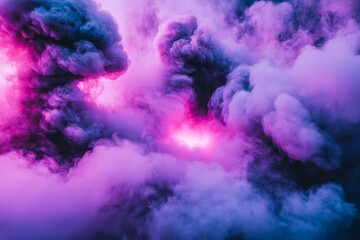 Colorful smoke swirling in the atmosphere creates a visually striking abstract pattern at dusk
