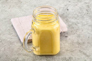Cold sweet mango smoothie glass